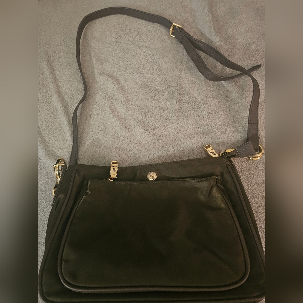 JPK Paris 75 Brown color nylon crossbody with adjustable strap.